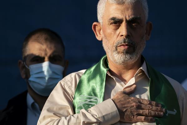Sinwar wearing Hamas scarf